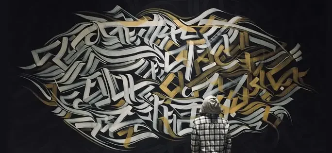 calligraffiti at advant navis business park office wall art calligraffiti in noida